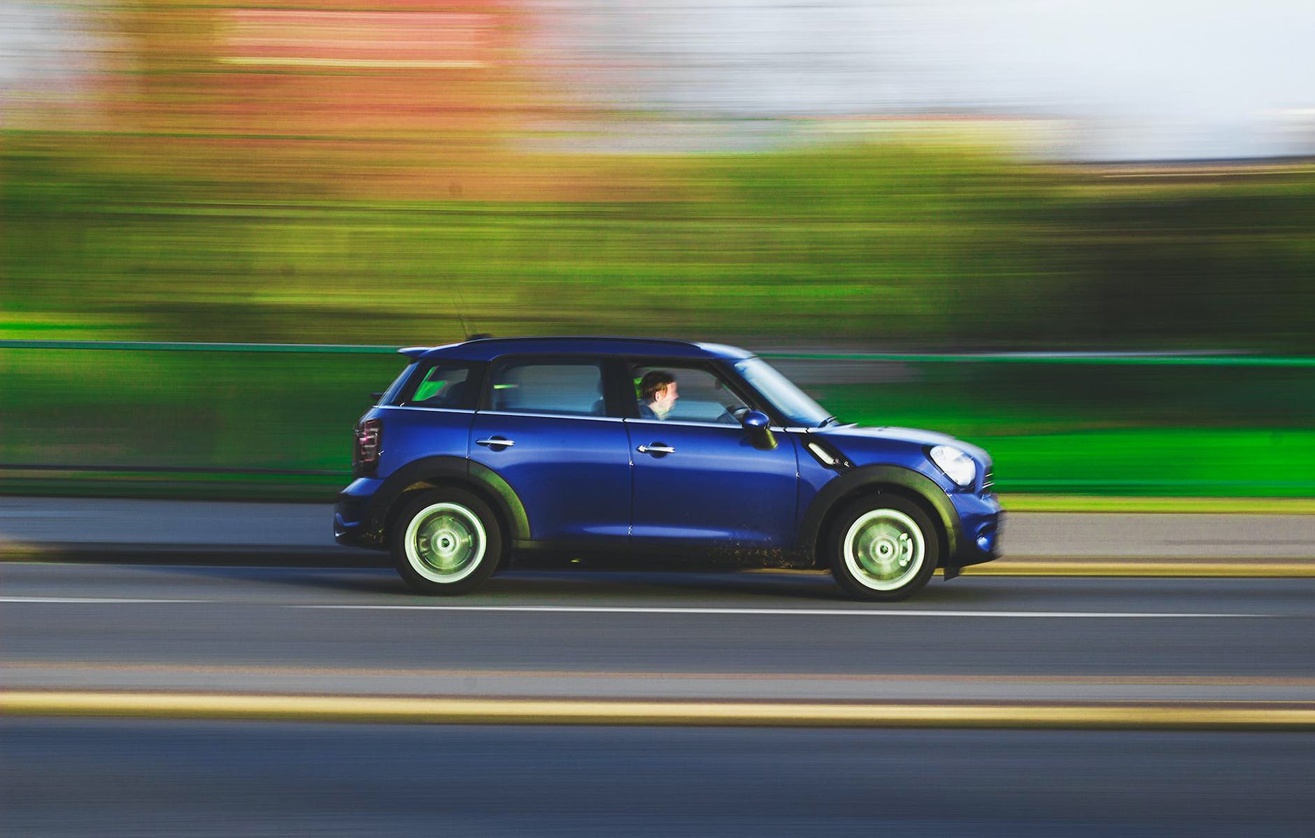 blue suv on road